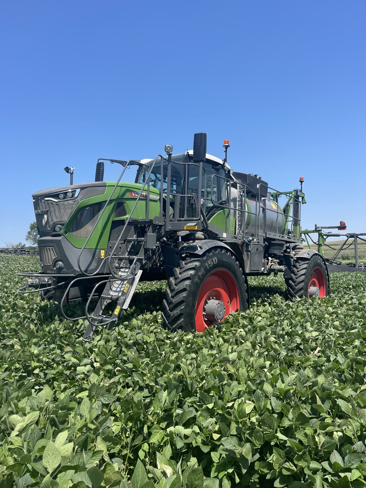 Bollmeyer Inc. sprayer in a soybean field